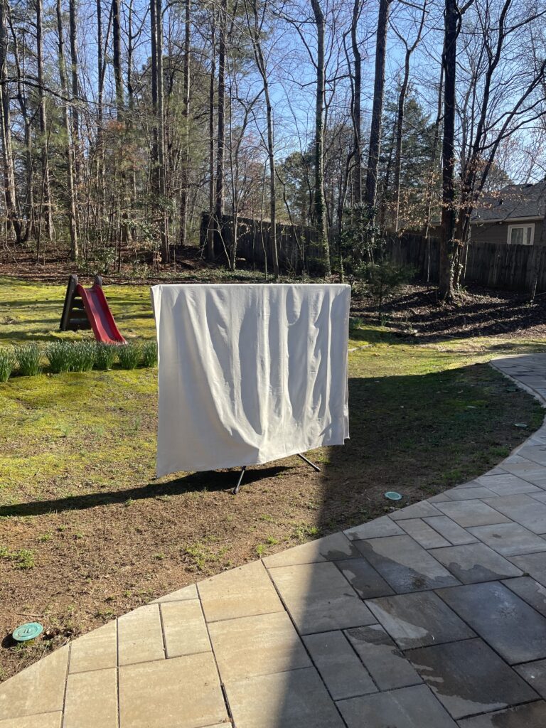 painted canvas drop cloth drying in the sun